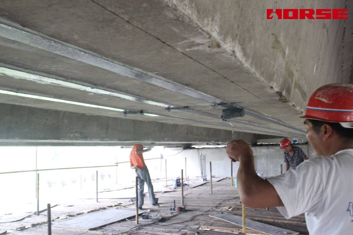 Pre-stress Carbon Fiber Laminates "Lock" Concrete Cracks Pre-stress Carbon Fiber Laminates "Lock" Concrete Cracks