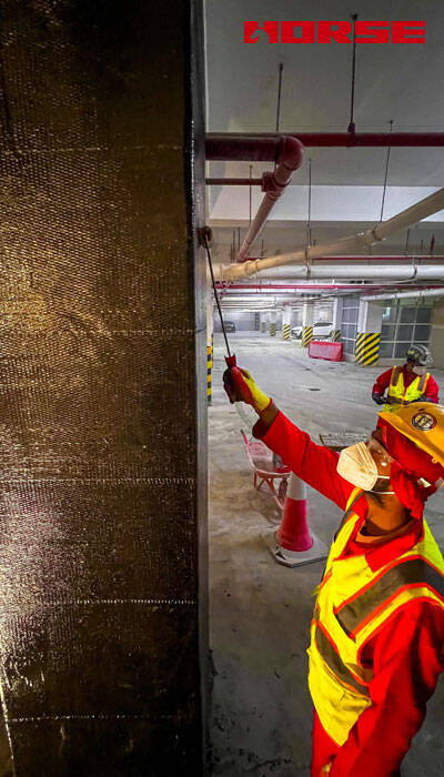 Structural Rehabilitation and Load Upgrading of Parking Structures Using Carbon Fiber 