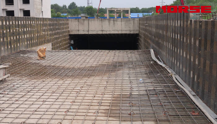 Structural Rehabilitation and Load Upgrading of Parking Structures Using Carbon Fiber 