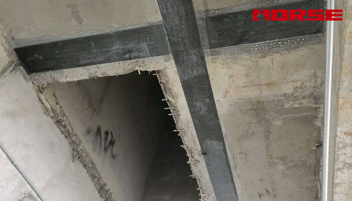Slab with Openings Strengthened with CFRP Carbon Fiber