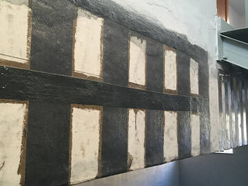 Gymnasium retrofitting using carbon fiber reinforced polymer fabric