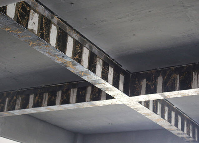 leveling adhesive for composite strengthening