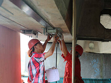 prestressed CFRP plate bridge reinforcement